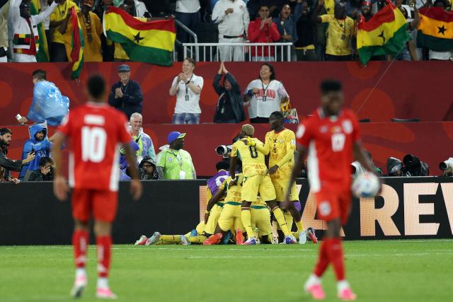 Ghana's midfielder #03 Caleb Yirenkyi (unseen) celebrates with teammates scoring his team's first goal during the 2026 World Cup Group L football match between Ghana and Panama at the Toronto Stadium in Toronto on June 17, 2026.  (Photo by Cole Burston / AFP)