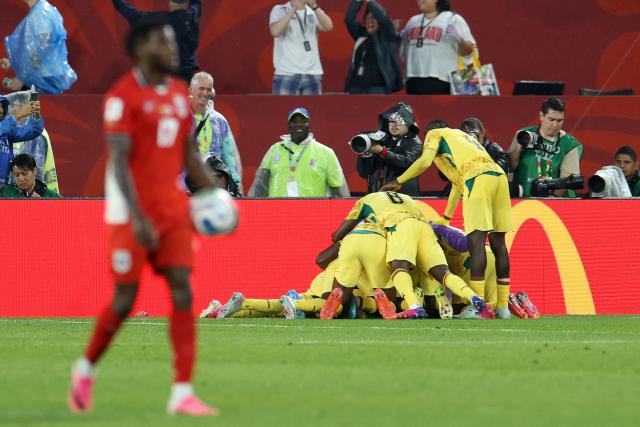 Ghana's midfielder #03 Caleb Yirenkyi (unseen) celebrates with teammates scoring his team's first goal during the 2026 World Cup Group L football match between Ghana and Panama at the Toronto Stadium in Toronto on June 17, 2026.  (Photo by Cole Burston / AFP)