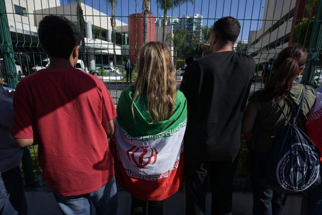 Iran fans wait for the team at the Marriott Hotel in Tijuana, Mexico, on June 17, 2026. (Photo by Guillermo Arias / AFP)