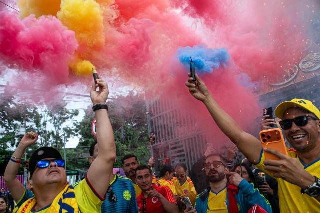 Colombia fans light flares outside the Mexico City Stadium ahead of the 2026 World Cup Group K football match between Uzbekistan and Colombia in Mexico City on June 17, 2026. (Photo by Oswaldo Ramirez / AFP)