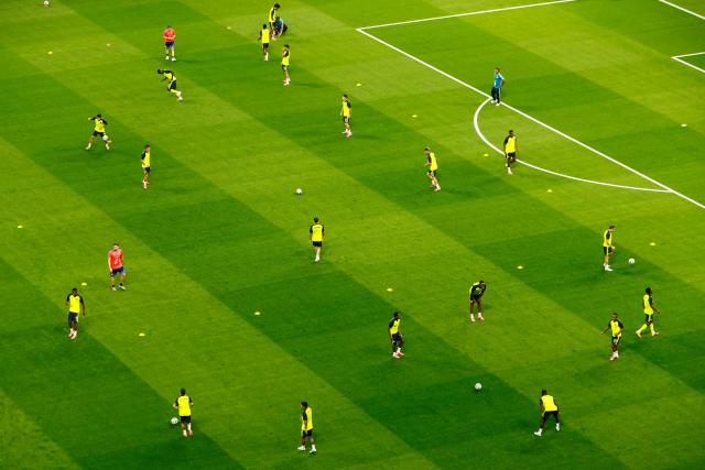 Colombia's players warm up ahead of the 2026 World Cup Group K football match between Uzbekistan and Colombia at the Mexico City Stadium in Mexico City on June 17, 2026.  (Photo by Rodrigo Oropeza / AFP)