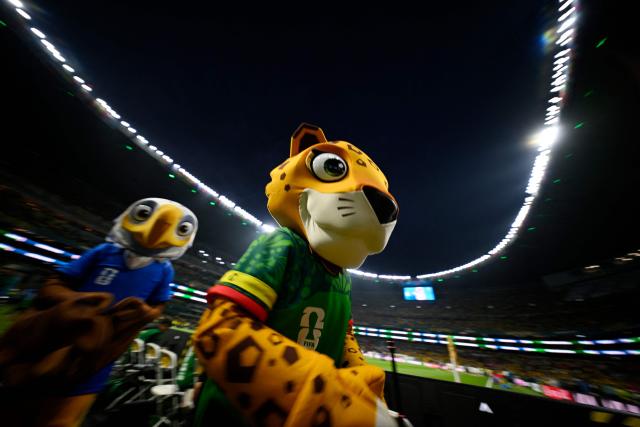 (L-R) Official World Cup mascots Clutch the Bald Eagle (US) and Zayu the Jaguar (Mexico) are pictured ahead of the 2026 World Cup Group K football match between Uzbekistan and Colombia at the Mexico City Stadium in Mexico City on June 17, 2026.  (Photo by Alfredo ESTRELLA / AFP)