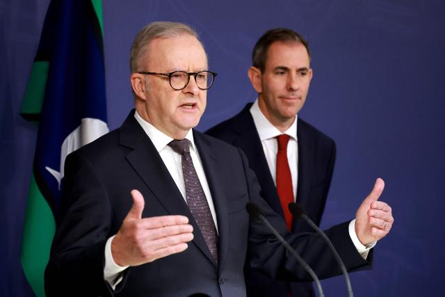 Australia’s Prime Minister Anthony Albanese (L) speaks as he stands with Australian Treasurer Jim Chalmers during a press conference regarding budget changes in Sydney on June 18, 2026. (Photo by DAVID GRAY / AFP)
