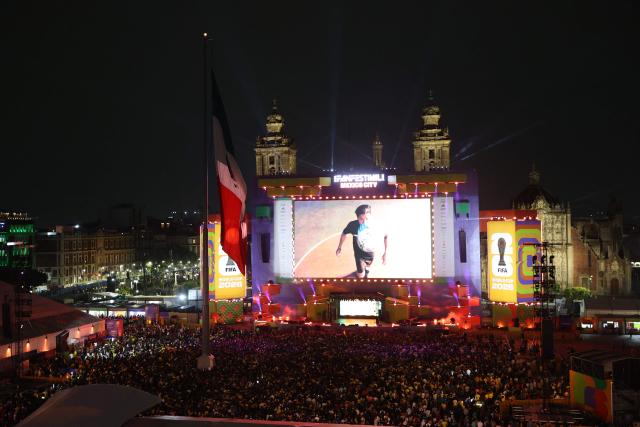 Fans gather at the FIFA Fan Festival in Mexico City's Zocalo to watch the 2026 World Cup Group K football match between Uzbekistan and Colombia in Mexico City on June 17, 2026. (Photo by LUIS CORTES / AFP)
