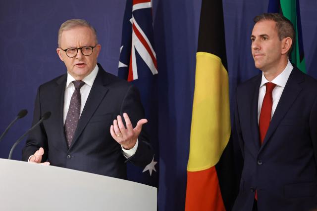 Australia’s Prime Minister Anthony Albanese (L) speaks as he stands next to Australian Treasurer Jim Chalmers during a press conference regarding budget changes in Sydney on June 18, 2026. (Photo by DAVID GRAY / AFP)