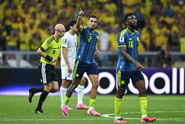 Colombia's defender #02 Daniel Munoz (C) celebrates scoring his team's first goal during the 2026 World Cup Group K football match between Uzbekistan and Colombia at the Mexico City Stadium in Mexico City on June 17, 2026.  (Photo by Yuri CORTEZ / AFP)