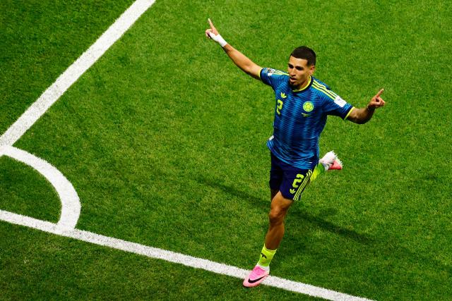 Colombia's defender #02 Daniel Munoz celebrates scoring his team's first goal during the 2026 World Cup Group K football match between Uzbekistan and Colombia at the Mexico City Stadium in Mexico City on June 17, 2026.  (Photo by Rodrigo Oropeza / AFP)