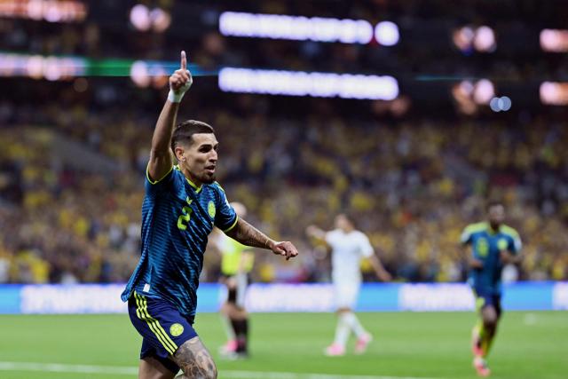 Colombia's defender #02 Daniel Munoz celebrates scoring his team's first goal during the 2026 World Cup Group K football match between Uzbekistan and Colombia at the Mexico City Stadium in Mexico City on June 17, 2026.  (Photo by CARL DE SOUZA / AFP)