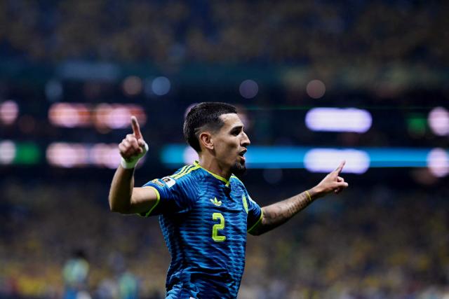 Colombia's defender #02 Daniel Munoz celebrates scoring his team's first goal during the 2026 World Cup Group K football match between Uzbekistan and Colombia at the Mexico City Stadium in Mexico City on June 17, 2026.  (Photo by CARL DE SOUZA / AFP)