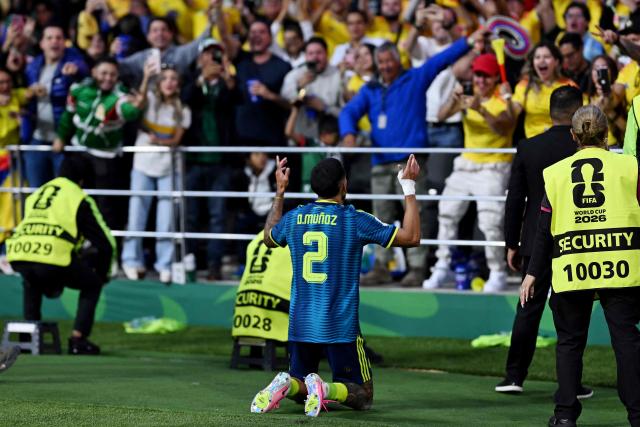 Colombia's defender #02 Daniel Munoz celebrates scoring his team's first goal during the 2026 World Cup Group K football match between Uzbekistan and Colombia at the Mexico City Stadium in Mexico City on June 17, 2026.  (Photo by CARL DE SOUZA / AFP)