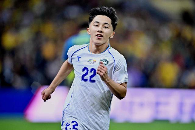 Uzbekistan's midfielder #22 Abbosbek Fayzullaev celebrates scoring his team's first goal during the 2026 World Cup Group K football match between Uzbekistan and Colombia at the Mexico City Stadium in Mexico City on June 17, 2026.  (Photo by CARL DE SOUZA / AFP)