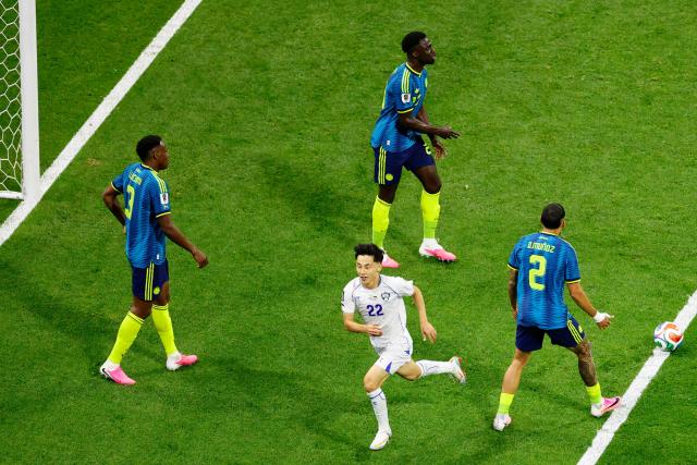 Uzbekistan's midfielder #22 Abbosbek Fayzullaev celebrates scoring his team's first goal during the 2026 World Cup Group K football match between Uzbekistan and Colombia at the Mexico City Stadium in Mexico City on June 17, 2026.  (Photo by Rodrigo Oropeza / AFP)
