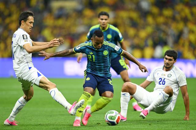 Uzbekistan's midfielder #07 Otabek Shukurov, Colombia's midfielder #21 Jaminton Campaz, and Uzbekistan's defender #26 Jakhongir Urozov fight for the ball during the 2026 World Cup Group K football match between Uzbekistan and Colombia at the Mexico City Stadium in Mexico City on June 17, 2026.  (Photo by Yuri CORTEZ / AFP)
