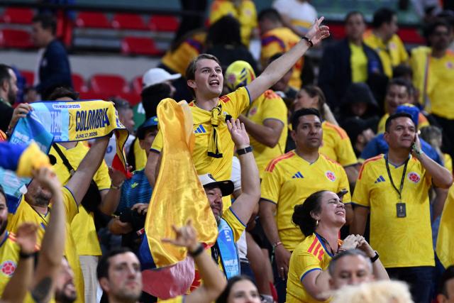 Colombian fans cheer for their team during the 2026 World Cup Group K football match between Uzbekistan and Colombia at the Mexico City Stadium in Mexico City on June 17, 2026.  (Photo by CARL DE SOUZA / AFP)