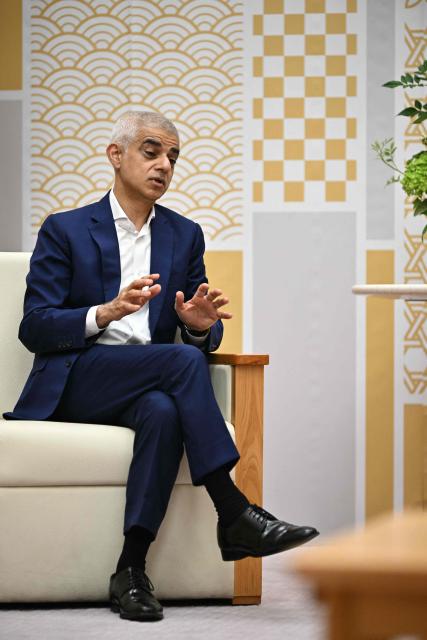 London's Mayor Sadiq Khan gestures during a meeting with Tokyo Governor Yuriko Koike at the Tokyo Metropolitan Government building in Tokyo on June 18, 2026. (Photo by Philip FONG / AFP)