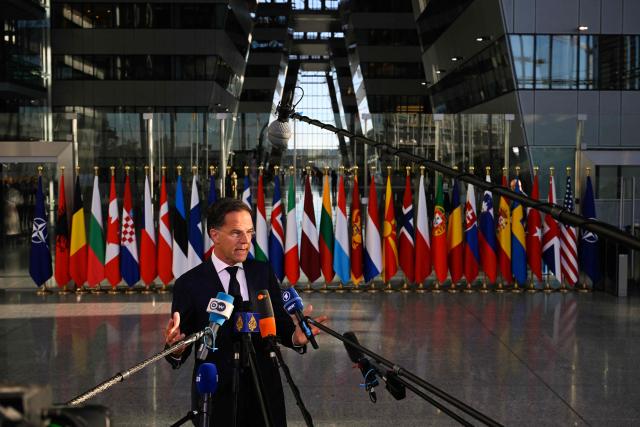 NATO Secretary General Mark Rutte makes a statement upon arriving to take part in a NATO Defence Ministers meeting at the NATO headquarters, in Brussels, on June 18, 2026. (Photo by JOHN THYS / AFP)