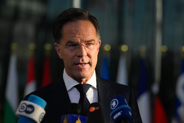 NATO Secretary General Mark Rutte makes a statement upon arriving to take part in a NATO Defence Ministers meeting at the NATO headquarters, in Brussels, on June 18, 2026. (Photo by JOHN THYS / AFP)