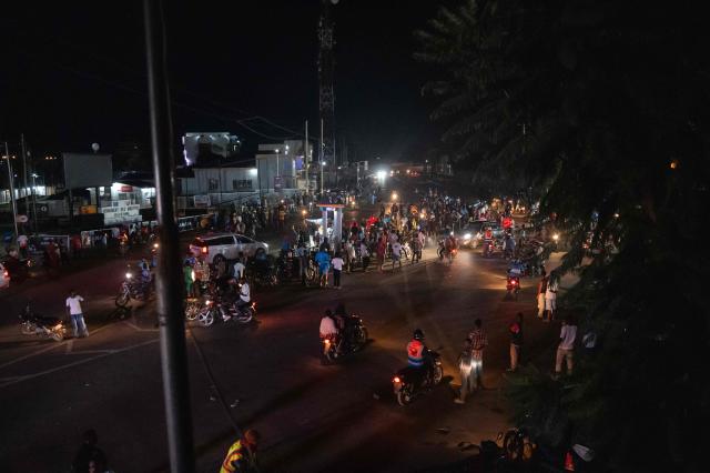 A general view of Congolese supporters gathering at the main round point during a FIFA World Cup match between DR Congo and Portugal in Bunia, Ituri Province, Democratic Republic of Congo, on June 17, 2026. Ituri, a remote province in northeastern Congo, is at the epicenter of the 17th Ebola outbreak, declared on May 15 in the DRC. The virus has infected 837 people and caused 196 deaths so far, according to the latest official figures.
In the city of Bunia alone, 215 cases of infection have been confirmed, while the DRCs testing capacity is limited. The scale of the health crisis is still unknown, scientists, aid workers, and international health authorities acknowledge.
But for 90 minutes of the match, some of the roughly 100 million inhabitants say they were able to escape the worries linked to the epidemic, the conflict in the east of the country, and the violence of armed groups. (Photo by Jospin Mwisha / AFP)