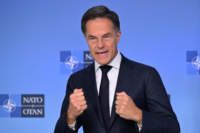 NATO Secretary General Mark Rutte delivers remarks before a NATO Defence Ministers meeting at the NATO headquarters, in Brussels, on June 18, 2026. (Photo by JOHN THYS / AFP)