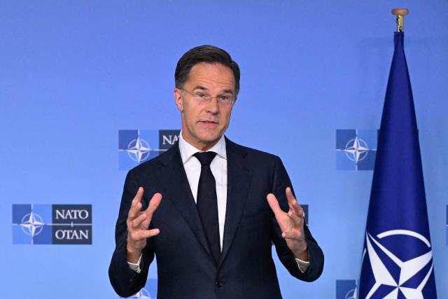 NATO Secretary General Mark Rutte delivers remarks before a NATO Defence Ministers meeting at the NATO headquarters, in Brussels, on June 18, 2026. (Photo by JOHN THYS / AFP)