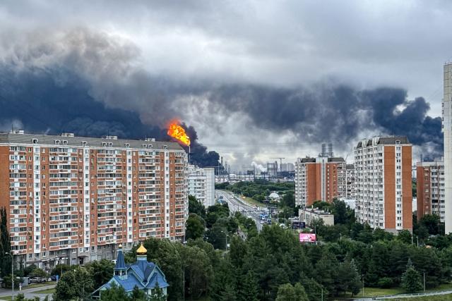 TOPSHOT - Black smoke rises from the area of the Russian oil producer Gazprom Neft's Moscow oil refinery on the south-eastern outskirts of Moscow on June 18, 2026. Moscow was fending off a "large-scale" drone attack from Ukraine, with several drones reaching an oil refinery, the city's mayor Sergey Sobyanin said early on June 18, 2026. (Photo by AFP)