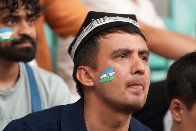 An Uzbek fan reacts as he watches a live broadcast of the 2026 World Cup Group K football match between Uzbekistan and Colombia at the Milliy Stadium in Tashkent on June 18, 2026. (Photo by Timur ISMOILOV / AFP)