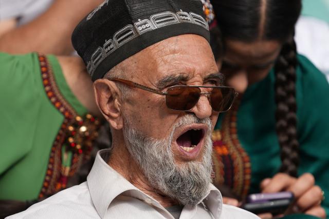 An Uzbek fan reacts as he watches a live broadcast of the 2026 World Cup Group K football match between Uzbekistan and Colombia at the Milliy Stadium in Tashkent on June 18, 2026. (Photo by Timur ISMOILOV / AFP)