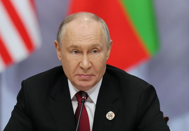 Russia's President Vladimir Putin attends a plenary session of the Russia-ASEAN summit, which commemorates 35 years of collaboration between Russia and the ASEAN countries, in the central Russian city of Kazan, around 700 kilometres (435 miles) east of the capital Moscow, on June 18, 2026. (Photo by Anastasia Barashkova / POOL / AFP)