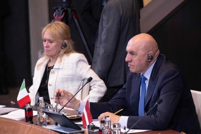 Iceland's Foreign Minister Porgerour Katrin Gunnarsdottir (L) and Italy's Defence Minister Guido Crosetto attend a NATO Defence Ministers meeting at the NATO headquarters, in Brussels, on June 18, 2026. (Photo by JOHN THYS / AFP)