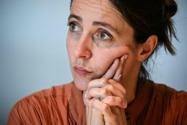 French trade union General Confederation of Labour (CGT) secretary general Sophie Binet  reacts as she gives a press conference at the Paper pulp producer Fibre Excellence factory site in Saint-Gaudens, south western France, on June 18, 2026 during a rally organised by employees as the company faces the withdrawal of its shareholder from Indonesia, Jackson Widjaja. The Fibre Excellence group, which employs 670 people, 275 in Saint-Gaudens and 270 in Tarascon, produces 500,000 tonnes annually out of the two million tonnes of paper pulp consumed in France. (Photo by Lionel BONAVENTURE / AFP)