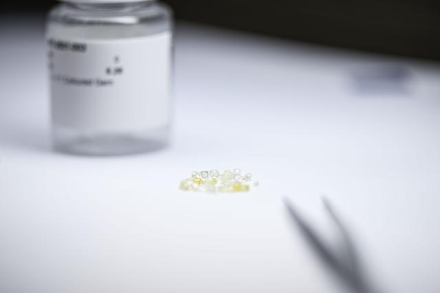 Traceable artisanally mined diamonds from DR Congo are pictured during their sales at the Antwerp World Diamond Centre (AWDC) in Antwerp on June 18, 2026. The diamonds originate from the Kasai region and were mined as part of OrigemA, a Belgian-Congolese initiative that guarantees a fully transparent chain. (Photo by Tom Goyvaerts / Belga / AFP) / Belgium OUT