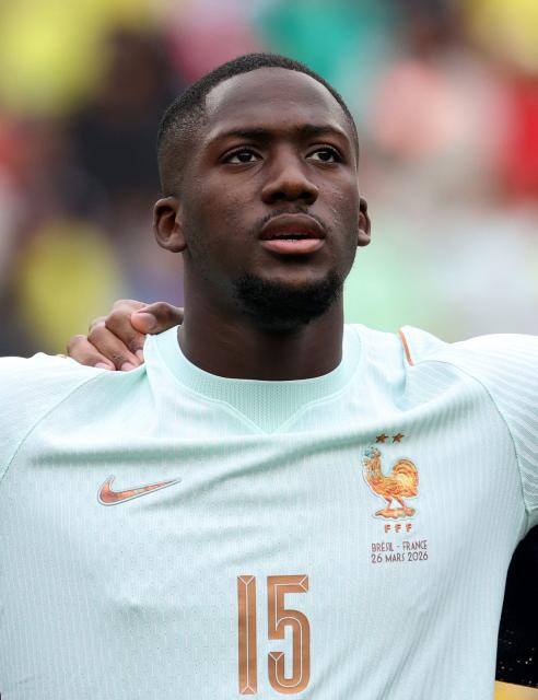 (FILES) France's defender #15 Ibrahima Konate listens to the national anthems ahead of a friendly football match between Brazil and France at Gillette Stadium in Foxborough, Massachusetts, on March 26, 2026. Real Madrid announced June 18, 2026 they had reached an agreement with Ibrahima Konate under which he will be a Real Madrid player for the next four seasons, until June 30, 2030. (Photo by FRANCK FIFE / AFP)