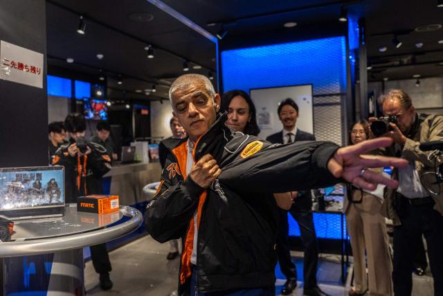 London's Mayor Sadiq Khan visits the Red Bull Gaming Sphere Tokyo in the city's Nakano district on June 18, 2026. (Photo by Philip FONG / AFP)