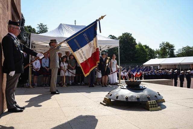 This photograph shows a view of the flame of the Resistance during the commemorative ceremony for the 86th anniversary of the Appeal of 18 June, in Mont Valerien on June 18, 2026. (Photo by SIMON WOHLFAHRT / POOL / AFP)