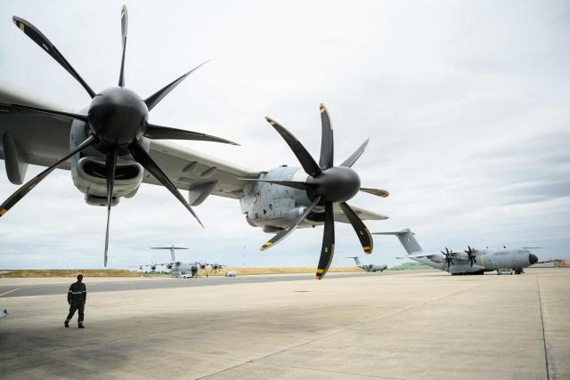 French airforce soldiers checks an Airbus military A400M Atlas plane after a joint military drill flight between French army and German army, at the 123 airforce Orleans-Bricy base in Bricy center France, on June 11, 2026.  (Photo by Loic VENANCE / AFP)