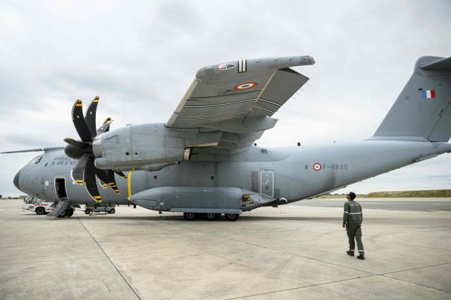 French airforce soldiers checks an Airbus military A400M Atlas plane after a joint military drill flight between French army and German army, at the 123 airforce Orleans-Bricy base in Bricy center France, on June 11, 2026.  (Photo by Loic VENANCE / AFP)