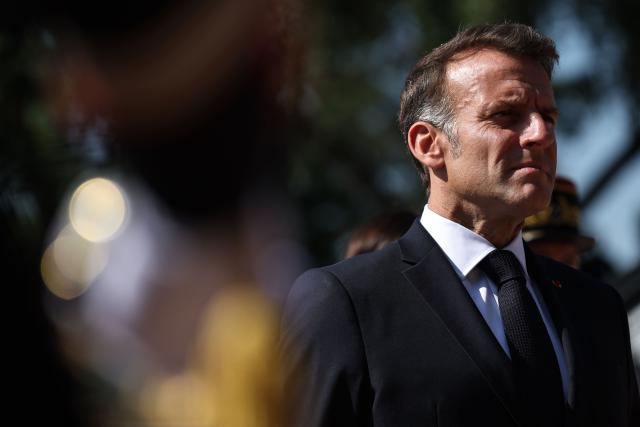 France's President Emmanuel Macron takes part in the commemorative ceremony for the 86th anniversary of the Appeal of 18 June, in Mont Valerien on June 18, 2026. (Photo by SIMON WOHLFAHRT / POOL / AFP)