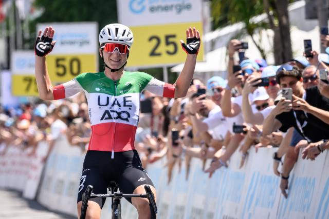 UAE Team ADQ Italian rider Elisa Longo Borghini celebrates after winning the second stage of the Women's Tour of Switzerland (Tour de Suisse) cycling race, 105.6 km from Locarno to Locarno on June 18, 2026. (Photo by Fabrice COFFRINI / AFP)