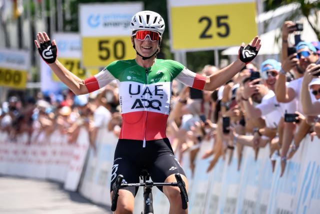 UAE Team ADQ Italian rider Elisa Longo Borghini celebrates after winning the second stage of the Women's Tour of Switzerland (Tour de Suisse) cycling race, 105.6 km from Locarno to Locarno on June 18, 2026. (Photo by Fabrice COFFRINI / AFP)