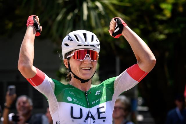 UAE Team ADQ Italian rider Elisa Longo Borghini celebrates after winning the second stage of the Women's Tour of Switzerland (Tour de Suisse) cycling race, 105.6 km from Locarno to Locarno on June 18, 2026. (Photo by Fabrice COFFRINI / AFP)