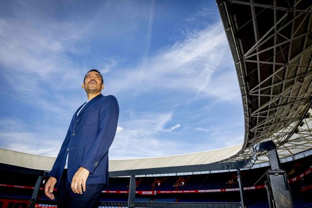 Newly appointed Feyenoord head coach Giovanni van Bronckhorst poses at De Kuip in Rotterdam on June 18, 2026. Dutch club Feyenoord appointed former captain Giovanni van Bronckhorst on June 17, 2026, as manager, replacing Robin van Persie after a frustrating season that saw them well adrift of rivals PSV Eindhoven. (Photo by Robin Utrecht / ANP / AFP) / Netherlands OUT