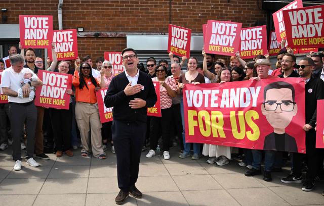 Labour party candidate Andy Burnham addresses supporters outside the Labour party campaign office in Ashton in Makerfield, northwest England, on June 18, 2026, as voters go to the polls to vote in the Makerfield by-election. Britain holds a unique vote on June 18 that could trigger the endgame for Labour leader Keir Starmer's beleaguered premiership, or win him a reprieve. (Photo by Oli SCARFF / AFP)