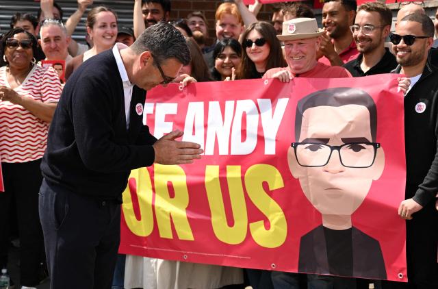 Labour party candidate Andy Burnham addresses supporters outside the Labour party campaign office in Ashton in Makerfield, northwest England, on June 18, 2026, as voters go to the polls to vote in the Makerfield by-election. Britain holds a unique vote on June 18 that could trigger the endgame for Labour leader Keir Starmer's beleaguered premiership, or win him a reprieve. (Photo by Oli SCARFF / AFP)