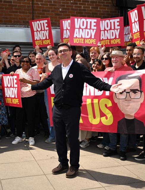 Labour party candidate Andy Burnham addresses supporters outside the Labour party campaign office in Ashton in Makerfield, northwest England, on June 18, 2026, as voters go to the polls to vote in the Makerfield by-election. Britain holds a unique vote on June 18 that could trigger the endgame for Labour leader Keir Starmer's beleaguered premiership, or win him a reprieve. (Photo by Oli SCARFF / AFP)