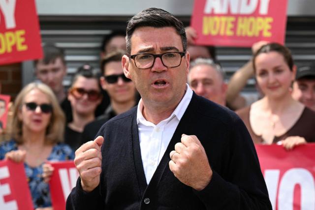 Labour party candidate Andy Burnham addresses supporters outside the Labour party campaign office in Ashton in Makerfield, northwest England, on June 18, 2026, as voters go to the polls to vote in the Makerfield by-election. Britain holds a unique vote on June 18 that could trigger the endgame for Labour leader Keir Starmer's beleaguered premiership, or win him a reprieve. (Photo by Oli SCARFF / AFP)