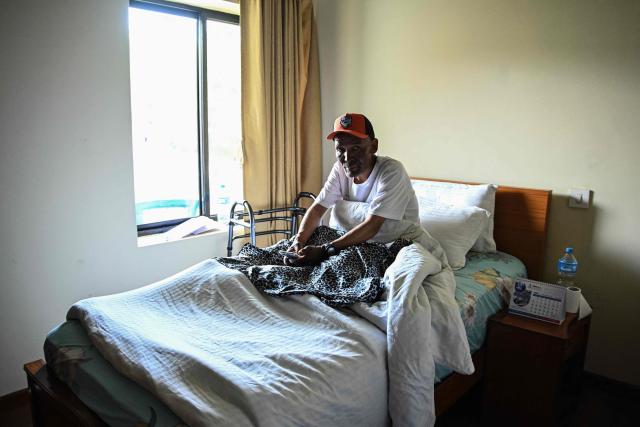Everest survivor Dawa Sherpa rests during his recovery at a hotel in Kathmandu on June 18, 2026. (Photo by Prakash MATHEMA / AFP)