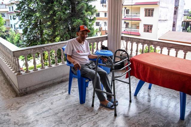 Everest survivor Dawa Sherpa rests during his recovery at a hotel in Kathmandu on June 18, 2026. (Photo by Prakash MATHEMA / AFP)