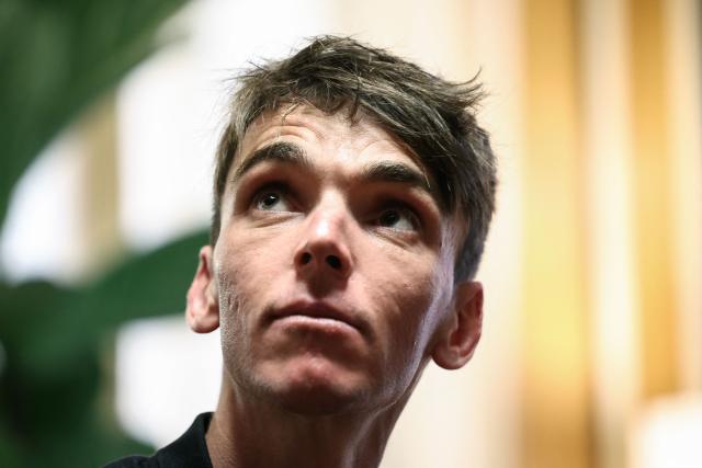 (FILES) Team DSM-Firmenich PostNL team's French rider Romain Bardet looks on during a press conference in Moulins, central France, on June 7, 2025, on the eve of the 77th edition of the Criterium du Dauphine cycling race. Romain Bardet, runner-up in the 2016 Tour de France and retired from racing for a year, will become the sports manager of Decathlon CMA CGM, Paul Seixas’s team, starting January 1, 2027, he announced on June 18, 2026. (Photo by Anne-Christine POUJOULAT / AFP)