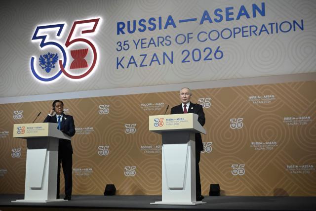 Russia's President Vladimir Putin speaks as he and Philippine President Ferdinand Marcos Jr. deliver press statements following the Russia-ASEAN summit, which commemorates 35 years of collaboration between Russia and the ASEAN countries, in the central Russian city of Kazan, around 700 kilometres (435 miles) east of the capital Moscow, on June 18, 2026. (Photo by Alexander NEMENOV / POOL / AFP)