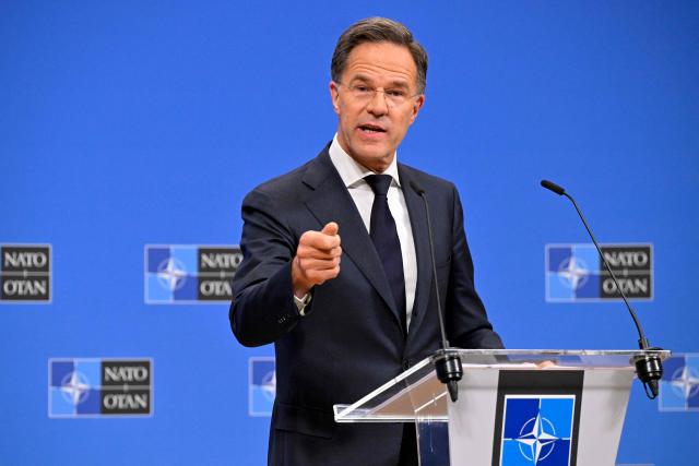 NATO Secretary General Mark Rutte holds a press conference on the sidelines of a NATO Defence Ministers meeting at the NATO headquarters, in Brussels, on June 18, 2026. (Photo by JOHN THYS / AFP)